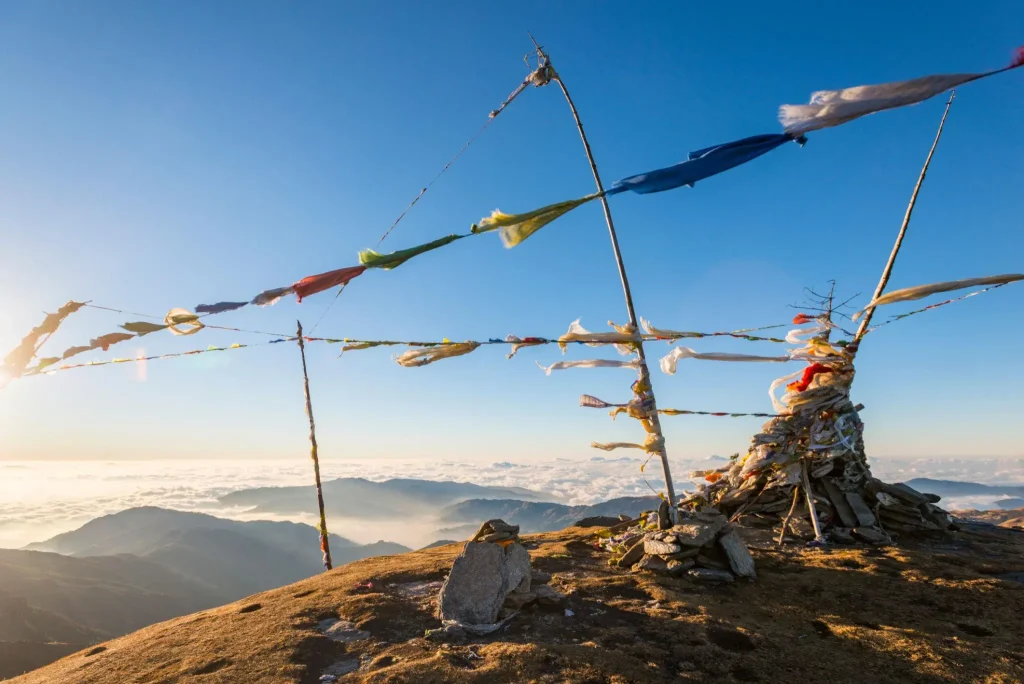 Pikey Peak summit with colorful Buddhist prayer flags